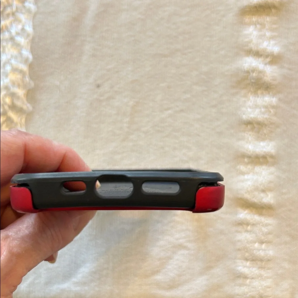 OtterBox Red and Black Phone Case; Fits I phone 15. Used, but still Useful!